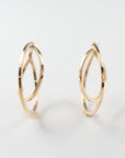 艶やかな地金の輝きが印象的な、MITURE(ミチュール)の大きなサークルピアス。大胆な円形フォルムがモダンな存在感を放ちます。