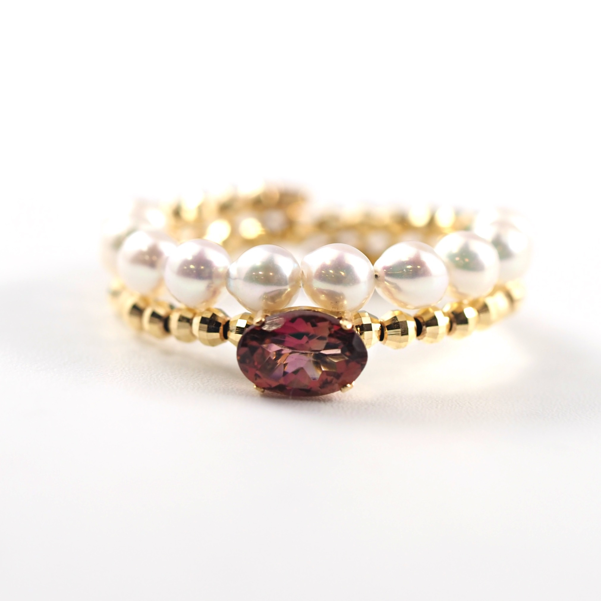 オーバルカットのピンクトルマリンが穏やかで上質な光を放つMITURE（ミチュール）のフリーサイズ2連リング。