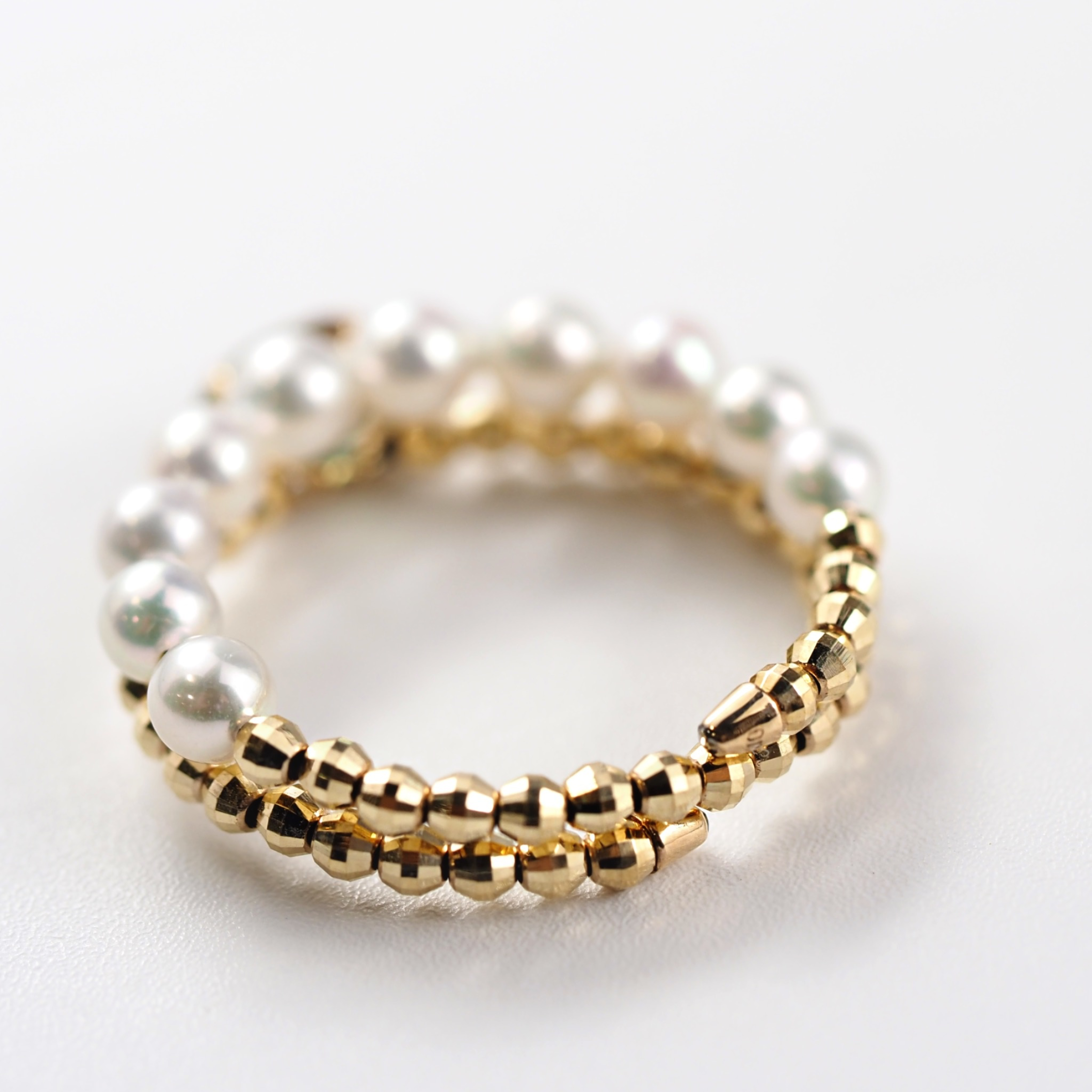 透明感と深みが調和したMITUREのオーバルカットグリーントルマリンリング。山梨県甲府市の職人による繊細な仕上げ。